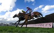 17 March 2023; The eventual winner Galopin Des Champs, left, with Paul Townend up, and of Bravemansgame, left, with Harry Cobden up, jump the last during the Boodles Cheltenham Gold Cup Chase during day four of the Cheltenham Racing Festival at Prestbury Park in Cheltenham, England. Photo by Harry Murphy/Sportsfile