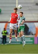 17 March 2023; Sam Curtis of St Patrick's Athletic in action against Sean Hoare of Shamrock Rovers during the SSE Airtricity Men's Premier Division match between Shamrock Rovers and St Patrick's Athletic at Tallaght Stadium in Dublin. Photo by Tyler Miller/Sportsfile
