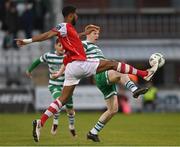 17 March 2023; Noah Lewis of St Patrick's Athletic in action against Rory Gaffney of Shamrock Rovers during the SSE Airtricity Men's Premier Division match between Shamrock Rovers and St Patrick's Athletic at Tallaght Stadium in Dublin. Photo by Ramsey Cardy/Sportsfile