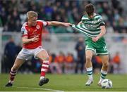 17 March 2023; Johnny Kenny of Shamrock Rovers in action against Jay McGrath of St Patrick's Athletic during the SSE Airtricity Men's Premier Division match between Shamrock Rovers and St Patrick's Athletic at Tallaght Stadium in Dublin. Photo by Tyler Miller/Sportsfile
