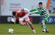 17 March 2023; Sam Curtis of St Patrick's Athletic is tackled by Trevor Clarke of Shamrock Rovers during the SSE Airtricity Men's Premier Division match between Shamrock Rovers and St Patrick's Athletic at Tallaght Stadium in Dublin. Photo by Tyler Miller/Sportsfile