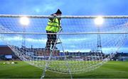 17 March 2023; Bohemians groundsman Paul Byrne prepares the nets before  the SSE Airtricity Men's Premier Division match between Bohemians and UCD at Dalymount Park in Dublin. Photo by Sam Barnes/Sportsfile