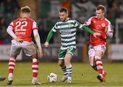 17 March 2023; Jack Byrne of Shamrock Rovers in action against Sam Curtis, left, and Mark Doyle of St Patrick's Athletic during the SSE Airtricity Men's Premier Division match between Shamrock Rovers and St Patrick's Athletic at Tallaght Stadium in Dublin. Photo by Ramsey Cardy/Sportsfile