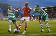 17 March 2023; Sam Curtis of St Patrick's Athletic in action against Sean Hoare, left, and Sean Kavanagh of Shamrock Rovers during the SSE Airtricity Men's Premier Division match between Shamrock Rovers and St Patrick's Athletic at Tallaght Stadium in Dublin. Photo by Tyler Miller/Sportsfile