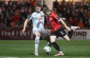 17 March 2023; Jamie McGonigle of Derry City in action against Nando Pijnaker of Sligo Rovers during the SSE Airtricity Men's Premier Division match between Derry City and Sligo Rovers at The Ryan McBride Brandywell Stadium in Derry. Photo by Stephen McCarthy/Sportsfile