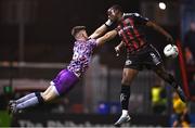 17 March 2023; Jonathan Afolabi of Bohemians in action against UCD goalkeeper Kian Moore during the SSE Airtricity Men's Premier Division match between Bohemians and UCD at Dalymount Park in Dublin. Photo by Sam Barnes/Sportsfile