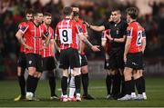 17 March 2023; Derry City players appeal to referee Adriano Reale during the SSE Airtricity Men's Premier Division match between Derry City and Sligo Rovers at The Ryan McBride Brandywell Stadium in Derry. Photo by Stephen McCarthy/Sportsfile