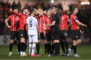 17 March 2023; Derry City players appeal to referee Adriano Reale during the SSE Airtricity Men's Premier Division match between Derry City and Sligo Rovers at The Ryan McBride Brandywell Stadium in Derry. Photo by Stephen McCarthy/Sportsfile