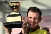 17 March 2023; Jockey Paul Townend with the Gold Cup after riding Galopin Des Champs to win the Boodles Cheltenham Gold Cup during day four of the Cheltenham Racing Festival at Prestbury Park in Cheltenham, England. Photo by Harry Murphy/Sportsfile