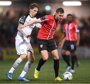 17 March 2023; Will Patching of Derry City in action against Bogdan Vastsuk of Sligo Rovers during the SSE Airtricity Men's Premier Division match between Derry City and Sligo Rovers at The Ryan McBride Brandywell Stadium in Derry. Photo by Stephen McCarthy/Sportsfile