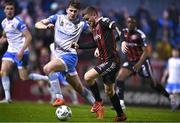 17 March 2023; Adam McDonnell of Bohemians in action against Harvey O'Brien of UCD during the SSE Airtricity Men's Premier Division match between Bohemians and UCD at Dalymount Park in Dublin. Photo by Sam Barnes/Sportsfile