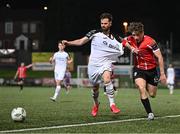 17 March 2023; Greg Bolger of Sligo Rovers in action against Ollie O'Neill of Derry City during the SSE Airtricity Men's Premier Division match between Derry City and Sligo Rovers at The Ryan McBride Brandywell Stadium in Derry. Photo by Stephen McCarthy/Sportsfile