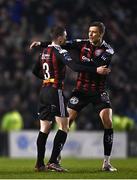 17 March 2023; Paddy Kirk of Bohemians, left, celebrates with team-mate Kacper Radkowski after scoring his side's first goal  during the SSE Airtricity Men's Premier Division match between Bohemians and UCD at Dalymount Park in Dublin. Photo by Sam Barnes/Sportsfile