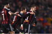 17 March 2023; Paddy Kirk of Bohemians, celebrates with team-mates, Declan McDaid, left, and Kacper Radkowski after scoring his side's first goal  during the SSE Airtricity Men's Premier Division match between Bohemians and UCD at Dalymount Park in Dublin. Photo by Sam Barnes/Sportsfile