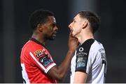 17 March 2023; Sadou Diallo of Derry City and Lukas Browning of Sligo Rovers during the SSE Airtricity Men's Premier Division match between Derry City and Sligo Rovers at The Ryan McBride Brandywell Stadium in Derry. Photo by Stephen McCarthy/Sportsfile