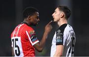 17 March 2023; Sadou Diallo of Derry City and Lukas Browning of Sligo Rovers during the SSE Airtricity Men's Premier Division match between Derry City and Sligo Rovers at The Ryan McBride Brandywell Stadium in Derry. Photo by Stephen McCarthy/Sportsfile