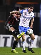 17 March 2023; Dara Keane of UCD in action against James Clarke of Bohemians    during the SSE Airtricity Men's Premier Division match between Bohemians and UCD at Dalymount Park in Dublin. Photo by Sam Barnes/Sportsfile