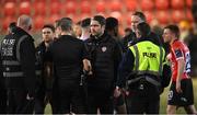 17 March 2023; Derry City manager Ruaidhrí Higgins speaks to referee Adriano Reale after the SSE Airtricity Men's Premier Division match between Derry City and Sligo Rovers at The Ryan McBride Brandywell Stadium in Derry. Photo by Stephen McCarthy/Sportsfile