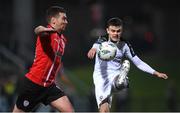 17 March 2023; Fabrice Hartmann of Sligo Rovers in action against Patrick McEleney of Derry City during the SSE Airtricity Men's Premier Division match between Derry City and Sligo Rovers at The Ryan McBride Brandywell Stadium in Derry. Photo by Stephen McCarthy/Sportsfile