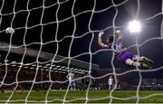 17 March 2023; UCD goalkeeper Kian Moore fails to save the shot of Paddy Kirk of Bohemians during the SSE Airtricity Men's Premier Division match between Bohemians and UCD at Dalymount Park in Dublin. Photo by Sam Barnes/Sportsfile