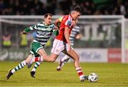 17 March 2023; Joe Redmond of St Patrick's Athletic in action against Sean Kavanagh of Shamrock Rovers during the SSE Airtricity Men's Premier Division match between Shamrock Rovers and St Patrick's Athletic at Tallaght Stadium in Dublin. Photo by Ramsey Cardy/Sportsfile