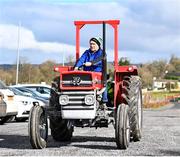 18 March 2023; Eugene McHugh from Anawim Adonai Africa charity arrives to St Josephs Park in Ederney on a Massey Ferguson 135 before the Allianz Football League Division 3 match between Fermanagh and Westmeath at St Josephs Park in Ederney, Fermanagh. Photo by Stephen Marken/Sportsfile