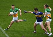 18 March 2023; Nigel Dunne of Offaly, supported by Jack McEvoy, right, in action against Emmet Moloney of Tipperary during the Allianz Football League Division 3 match between Tipperary and Offaly at FBD Semple Stadium in Thurles, Tipperary. Photo by Ray McManus/Sportsfile