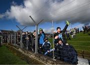 18 March 2023; Dublin supporters celebrate a score during the Allianz Football League Division 2 match between Meath and Dublin at Páirc Tailteann in Navan, Meath. Photo by David Fitzgerald/Sportsfile