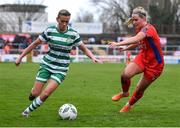 18 March 2023; Abbie Larkin of Shamrock Rovers in action against Jessie Staplton of Shelbourne during the SSE Airtricity Women's Premier Division match between Shelbourne and Shamrock Rovers at Tolka Park in Dublin. Photo by Tyler Miller/Sportsfile
