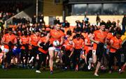 18 March 2023; Armagh players, including Rían O'Neill, centre, break from the team photograph before the Allianz Football League Division 1 match between Armagh and Galway at Box-It Athletic Grounds in Armagh. Photo by Ben McShane/Sportsfile