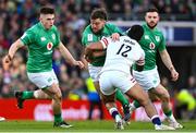 18 March 2023; Andrew Porter of Ireland is tackled by Manu Tuilagi of England during the Guinness Six Nations Rugby Championship match between Ireland and England at Aviva Stadium in Dublin. Photo by Ramsey Cardy/Sportsfile