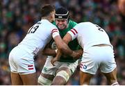 18 March 2023; James Ryan of Ireland is tackled by Henry Slade, left, and Jamie George of England during the Guinness Six Nations Rugby Championship match between Ireland and England at Aviva Stadium in Dublin. Photo by Harry Murphy/Sportsfile