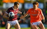 18 March 2023; Patrick Kelly of Galway in action against Jason Duffy of Armagh during the Allianz Football League Division 1 match between Armagh and Galway at Box-It Athletic Grounds in Armagh. Photo by Ben McShane/Sportsfile