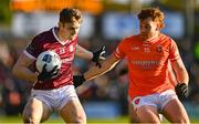 18 March 2023; Patrick Kelly of Galway in action against Jason Duffy of Armagh during the Allianz Football League Division 1 match between Armagh and Galway at Box-It Athletic Grounds in Armagh. Photo by Ben McShane/Sportsfile