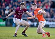 18 March 2023; Jarly Óg Burns of Armagh in action against Patrick Kelly of Galway during the Allianz Football League Division 1 match between Armagh and Galway at Box-It Athletic Grounds in Armagh. Photo by Ben McShane/Sportsfile