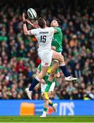 18 March 2023; Hugo Keenan of Ireland and Freddie Steward of England contest a high ball during the Guinness Six Nations Rugby Championship match between Ireland and England at Aviva Stadium in Dublin. Photo by Ramsey Cardy/Sportsfile