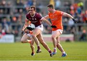18 March 2023; John Maher of Galway in action against Tiernan Kelly of Armagh during the Allianz Football League Division 1 match between Armagh and Galway at Box-It Athletic Grounds in Armagh. Photo by Ben McShane/Sportsfile