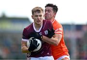 18 March 2023; Cian Hernon of Galway is tackled by Stefan Campbell of Armagh during the Allianz Football League Division 1 match between Armagh and Galway at Box-It Athletic Grounds in Armagh. Photo by Ben McShane/Sportsfile