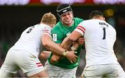 18 March 2023; James Ryan of Ireland is tackled by David Ribbans, left, and Ellis Genge of England during the Guinness Six Nations Rugby Championship match between Ireland and England at Aviva Stadium in Dublin. Photo by Harry Murphy/Sportsfile