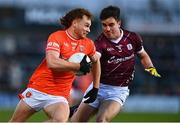 18 March 2023; Jason Duffy of Armagh in action against Seán Kelly of Galway during the Allianz Football League Division 1 match between Armagh and Galway at Box-It Athletic Grounds in Armagh. Photo by Ben McShane/Sportsfile