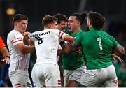 18 March 2023; Andrew Porter of Ireland, right, and teammate James Lowe tussle with Jack van Poortvliet, second from left, and Owen Farrell of England during the Guinness Six Nations Championship match between Ireland and England at Aviva Stadium in Dublin. Photo by Harry Murphy/Sportsfile