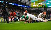 18 March 2023; Dan Sheehan of Ireland dives over to score his side's third try despite the tackle of Dan Cole of England during the Guinness Six Nations Rugby Championship match between Ireland and England at the Aviva Stadium in Dublin. Photo by Seb Daly/Sportsfile