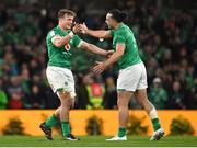 18 March 2023; Josh van der Flier of Ireland, left, and teammate James Lowe celebrate after their side's victory in the Guinness Six Nations Rugby Championship match between Ireland and England at the Aviva Stadium in Dublin. Photo by Seb Daly/Sportsfile