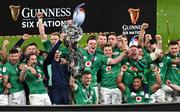 18 March 2023; Ireland players celebrate with the Six Nations trophy and Triple Crown trophy after the Guinness Six Nations Rugby Championship match between Ireland and England at Aviva Stadium in Dublin. Photo by Ramsey Cardy/Sportsfile