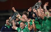18 March 2023; Jonathan Sexton of Ireland lifts the Six Nations trophy alongside teammates after the Guinness Six Nations Rugby Championship match between Ireland and England at Aviva Stadium in Dublin. Photo by Seb Daly/Sportsfile