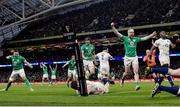 18 March 2023; Ireland players, from left, Jack Conan, James Ryan, and Mack Hansen celebrate their side's third try, scored by teammate Dan Sheehan, not pictured, during the Guinness Six Nations Rugby Championship match between Ireland and England at the Aviva Stadium in Dublin. Photo by Seb Daly/Sportsfile
