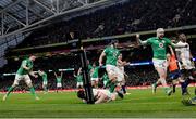 18 March 2023; Ireland players, from left, Jack Conan, James Ryan, and Mack Hansen celebrate their side's third try, scored by teammate Dan Sheehan, not pictured, during the Guinness Six Nations Rugby Championship match between Ireland and England at the Aviva Stadium in Dublin. Photo by Seb Daly/Sportsfile