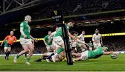 18 March 2023; Rob Herring of Ireland dives over to score his side's fourth try during the Guinness Six Nations Rugby Championship match between Ireland and England at the Aviva Stadium in Dublin. Photo by Seb Daly/Sportsfile