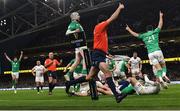 18 March 2023; Ireland players Mack Hansen, centre, and Conor Murray, 21, celebrate their side's fourth try, scored by teammate Rob Herring, during the Guinness Six Nations Rugby Championship match between Ireland and England at the Aviva Stadium in Dublin. Photo by Seb Daly/Sportsfile