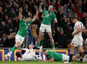 18 March 2023; Conor Murray of Ireland, left, and teammate Mack Hansen, right, celebrate after Dave Kilcoyne scores their side's fourth try during the Guinness Six Nations Rugby Championship match between Ireland and England at Aviva Stadium in Dublin. Photo by Harry Murphy/Sportsfile